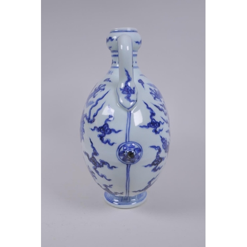 188 - A blue and white porcelain two handled moon flask with dragon decoration, Chinese Xuande 6 character... 