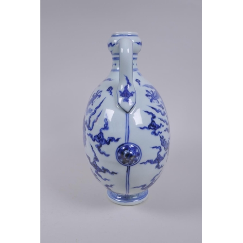 188 - A blue and white porcelain two handled moon flask with dragon decoration, Chinese Xuande 6 character... 