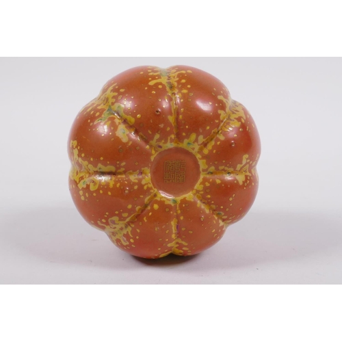 19 - A Chinese polychrome porcelain pumpkin, gold Qianlong seal mark to base, 10cm high, 10cm diameter