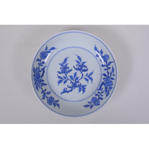 190 - A C19th Chinese blue and white porcelain dish decorated with peaches, pomegranates and Buddha's hand... 