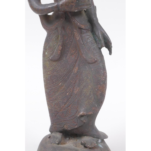 20 - An antique Burmese bronze female figure, 21cm high