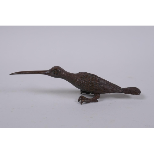 205 - A Japanese bronze okimono of a long beaked bird, 14cm long