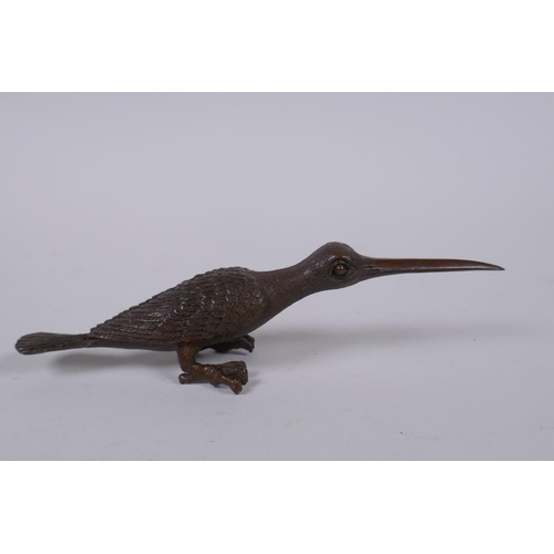 205 - A Japanese bronze okimono of a long beaked bird, 14cm long