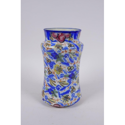 207 - An antique continental majolica vase of waisted form, 20cm high