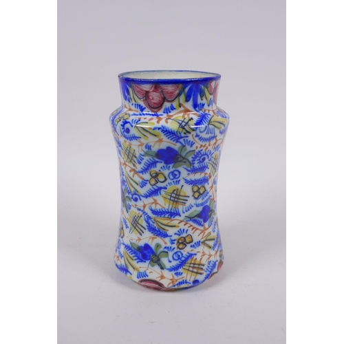 207 - An antique continental majolica vase of waisted form, 20cm high