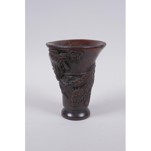 210 - A Chinese faux horn libation cup with raised phoenix  decoration, 13cm high