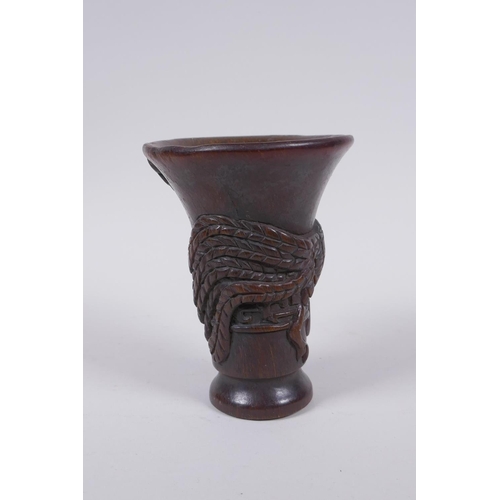 210 - A Chinese faux horn libation cup with raised phoenix  decoration, 13cm high