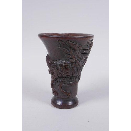 210 - A Chinese faux horn libation cup with raised phoenix  decoration, 13cm high