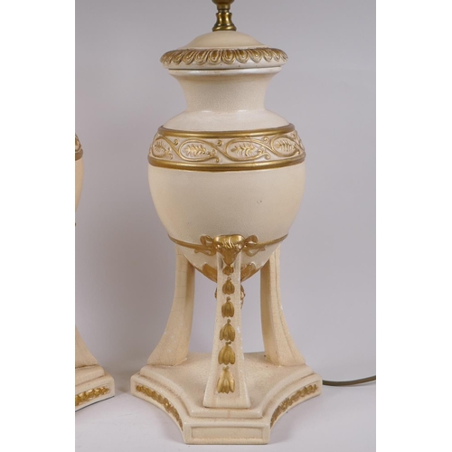 214 - A pair of painted ceramic urn shaped table lamps with gilt details, 52cm high