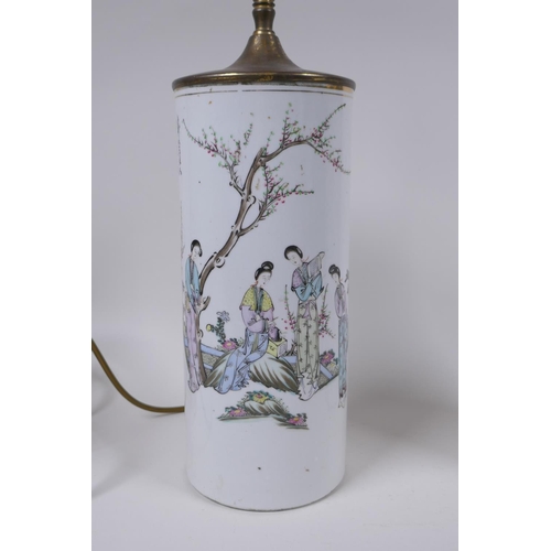 28 - A pair of Chinese Republic porcelain cylinder vases decorated with women of leisure in a garden, con... 