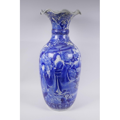 31 - A Japanese Meiji period blue and white porcelain vase with a frilled rim, decorated with geisha and ... 