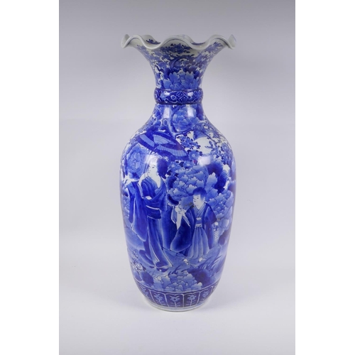 31 - A Japanese Meiji period blue and white porcelain vase with a frilled rim, decorated with geisha and ... 