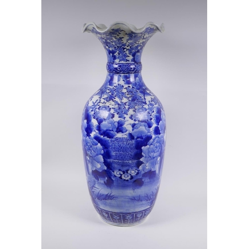 31 - A Japanese Meiji period blue and white porcelain vase with a frilled rim, decorated with geisha and ... 