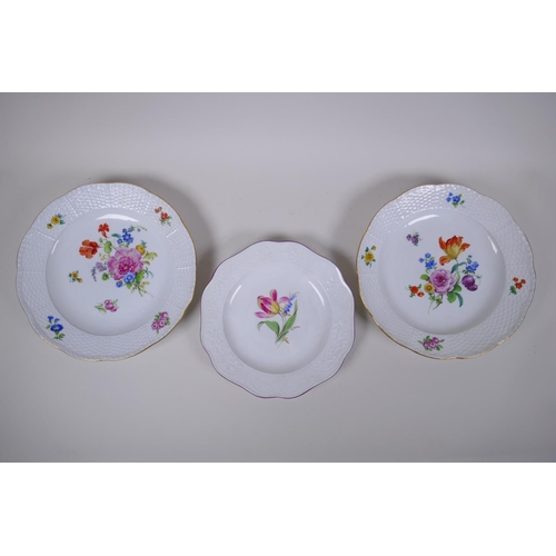 42 - A pair of late C19th/early C20th hand painted Meissen cabinet plates with moulded basket weave rims,... 