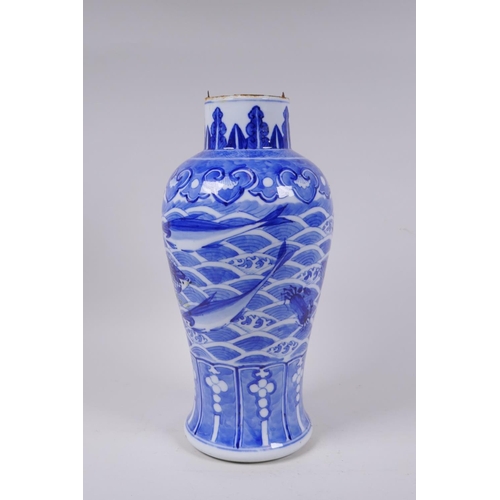 5 - A C19th Chinese blue and white porcelain vase decorated with carp and crabs, Xuande 4 character mark... 