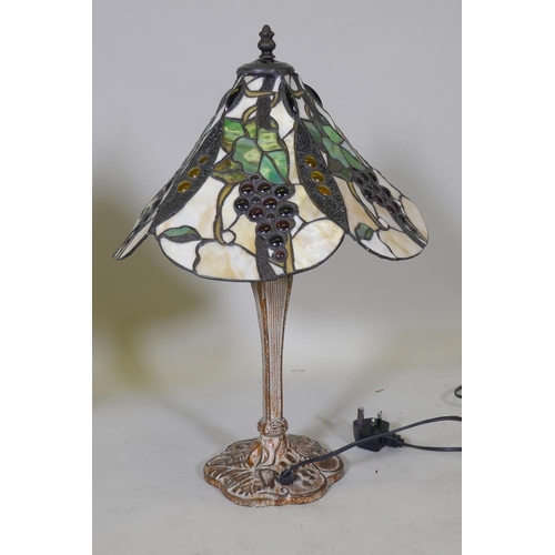 51 - A pair of Tiffany style table lamps, with metal bases and glass shades, 55cm high