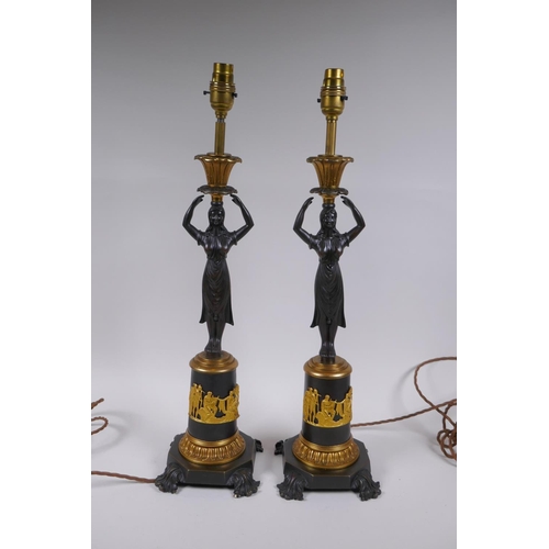 54 - A pair of bronze and ormolu figural lamps, 54cm high