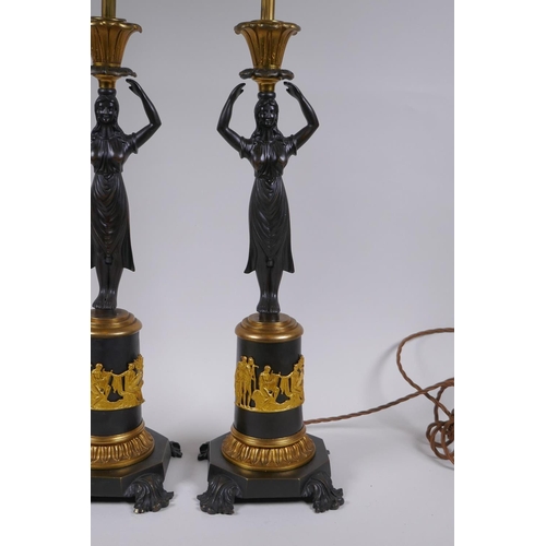 54 - A pair of bronze and ormolu figural lamps, 54cm high