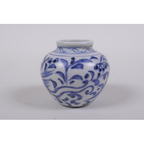 62 - An early Chinese miniature blue and white porcelain pot with phoenix decoration, possibly Yuan dynas... 