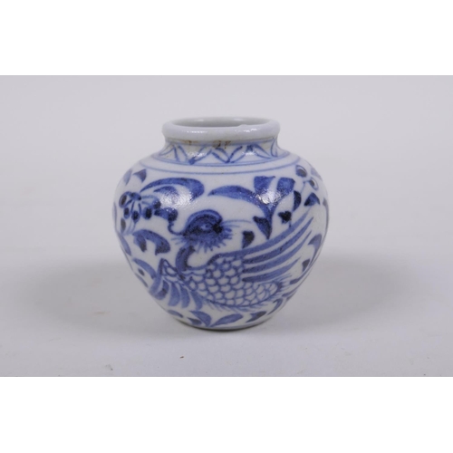 62 - An early Chinese miniature blue and white porcelain pot with phoenix decoration, possibly Yuan dynas... 