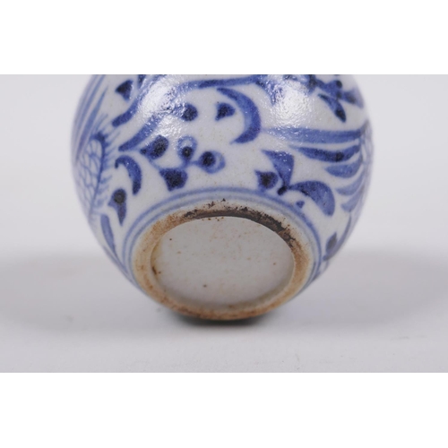 62 - An early Chinese miniature blue and white porcelain pot with phoenix decoration, possibly Yuan dynas... 