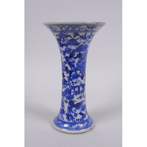 6 - A C19th Chinese blue and white porcelain vase of waisted form, decorated with lotus flowers and bird... 