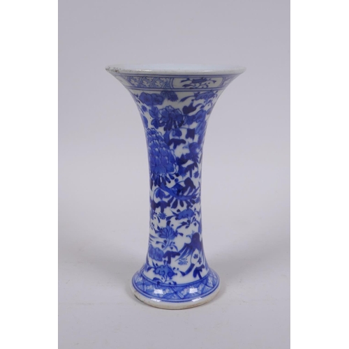 6 - A C19th Chinese blue and white porcelain vase of waisted form, decorated with lotus flowers and bird... 