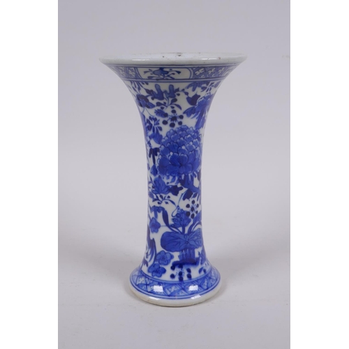 6 - A C19th Chinese blue and white porcelain vase of waisted form, decorated with lotus flowers and bird... 