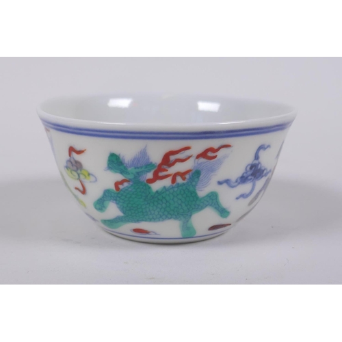 73 - A doucai porcelain tea bowl with kylin decoration, Chinese Chenghua 6 character mark to base, 8cm wi... 