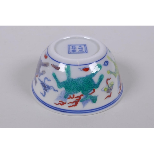 73 - A doucai porcelain tea bowl with kylin decoration, Chinese Chenghua 6 character mark to base, 8cm wi... 