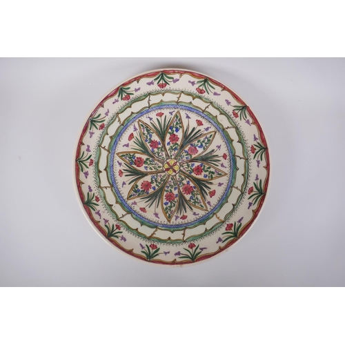 75 - A hand painted studio pottery charger, signed 'Doyer' to base and dated '95, 36cm diameter