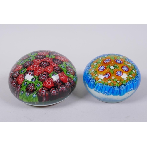 79 - A millefiori glass paperweight, and another smaller, largest 10cm diameter