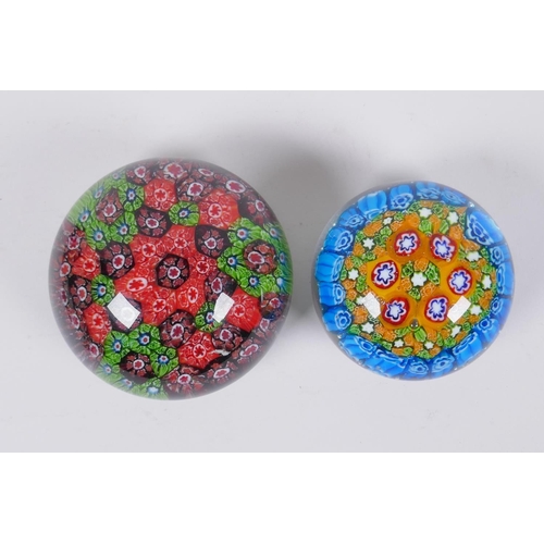 79 - A millefiori glass paperweight, and another smaller, largest 10cm diameter