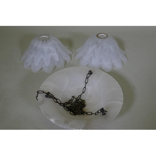 80 - An antique alabaster ceiling lamp shade with copper mounts, 30cm diameter, and a pair of glass petal... 