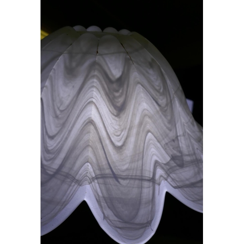 80 - An antique alabaster ceiling lamp shade with copper mounts, 30cm diameter, and a pair of glass petal... 