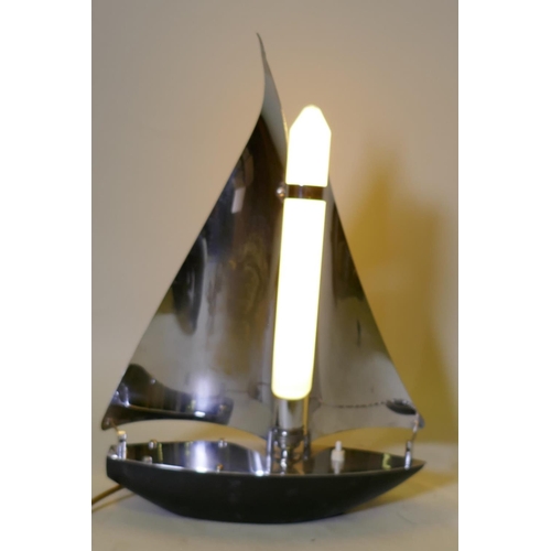 81 - An Art Deco chrome table lamp in the form of a sailing boat, 48cm high