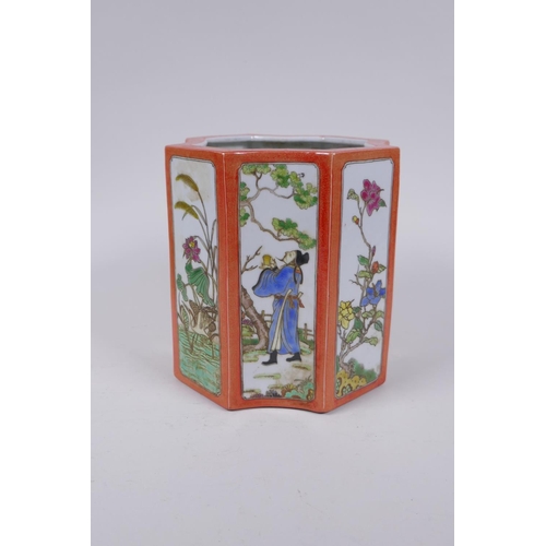 83 - A Chinese shaped porcelain brush pot with famille vert decorative panels depicting figures and flowe... 