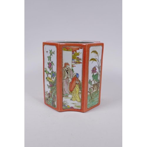 83 - A Chinese shaped porcelain brush pot with famille vert decorative panels depicting figures and flowe... 