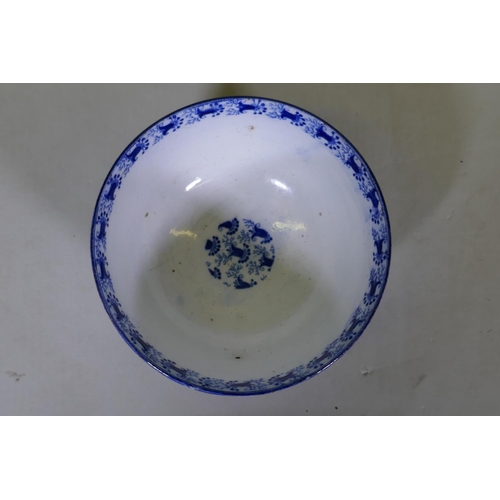 84 - An C18th/C19th pearlware bowl with blue and white transfer decoration of harebells, repairs to foot,... 