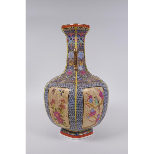 90 - A Chinese polychrome porcelain two handled vase with decorative panels depicting birds, butterflies ... 