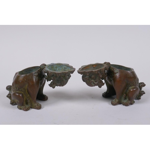 92 - A pair of Japanese censers and covers in the form of temple lions, marks to base, 7cm high