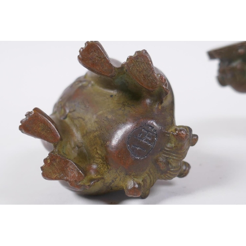 92 - A pair of Japanese censers and covers in the form of temple lions, marks to base, 7cm high