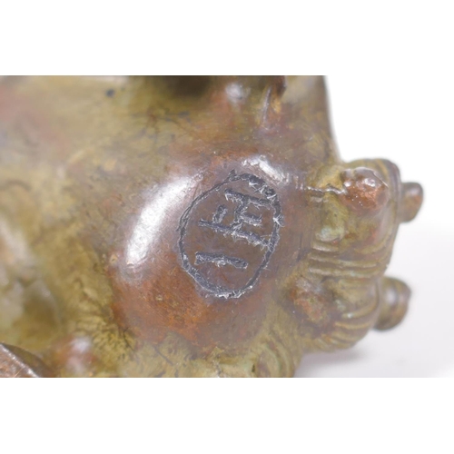 92 - A pair of Japanese censers and covers in the form of temple lions, marks to base, 7cm high