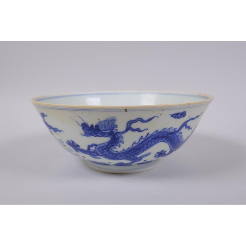 93 - A Chinese blue and white porcelain bowl with dragon decoration, Chenghua 6 character mark to base, 1... 