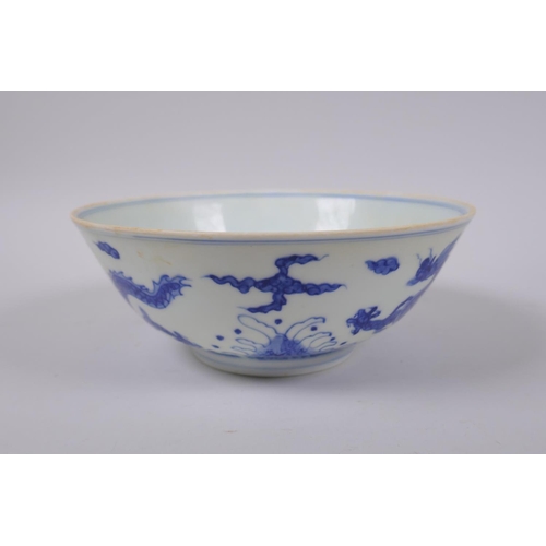 93 - A Chinese blue and white porcelain bowl with dragon decoration, Chenghua 6 character mark to base, 1... 