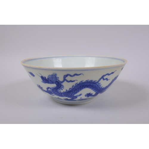 93 - A Chinese blue and white porcelain bowl with dragon decoration, Chenghua 6 character mark to base, 1... 