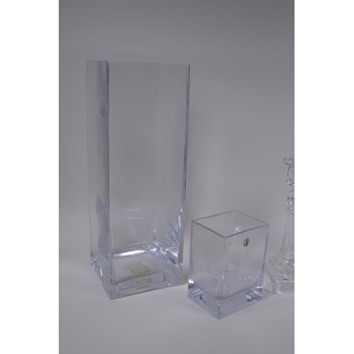 97 - A contemporary handmade glass vase of square form and another smaller, together with a pair of mould... 