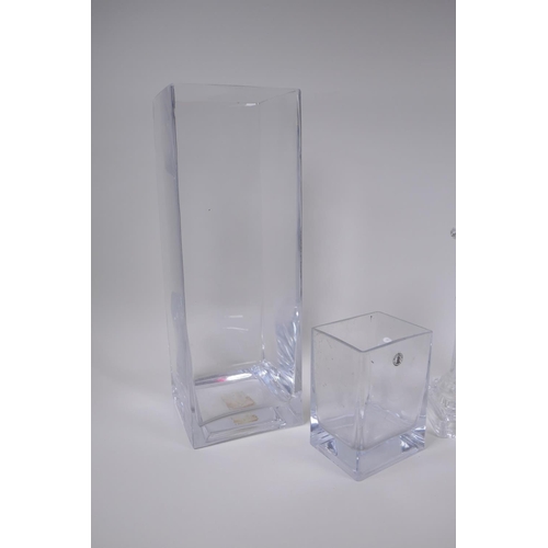 97 - A contemporary handmade glass vase of square form and another smaller, together with a pair of mould... 