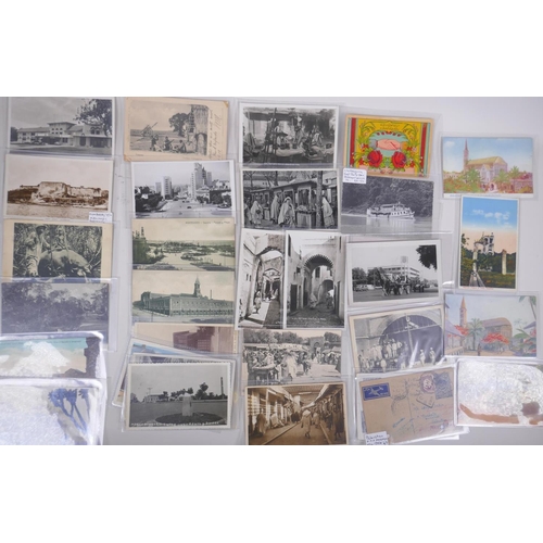 254 - A quantity of late C19th and C20th world postcards including Uganda, Uruguay, Pakistan, Zanzibar, Mo... 