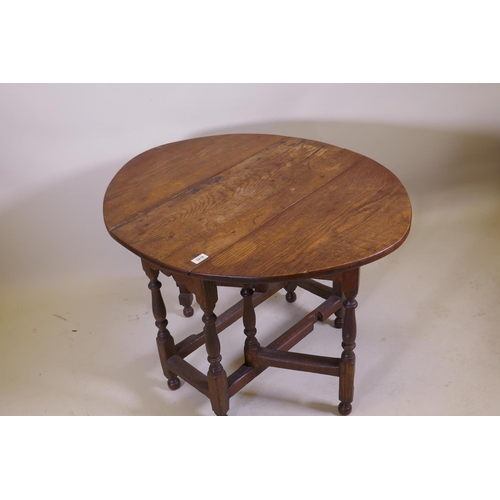 1019 - A C19th oak gateleg table with a single drawer, 76 x 34cm, 62cm high, 76 x 96cm extended